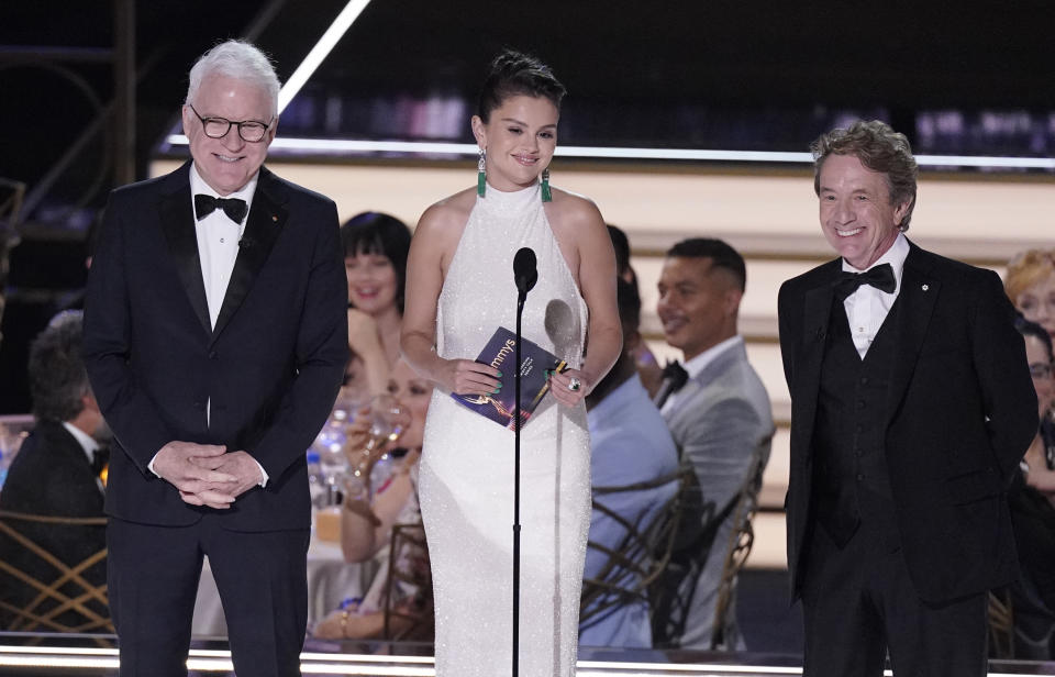 Steve Martin, from left, Selena Gomez, and Martin Short present the Emmy for outstanding variety talk series at the 74th Primetime Emmy Awards on Monday, Sept. 12, 2022, at the Microsoft Theater in Los Angeles. (AP Photo/Mark Terrill)