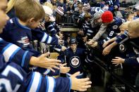 <p><b>Patrik Laine</b> is reminiscent of another young Finn - the great Teemu Selanne - that came to Winnipeg and took the NHL by storm. As an 18-year-old, he's already one of the top goal scorers in the league. "I've never seen anybody score goals like Patrik Laine does in practice. Ever, in 20 years," Jets coach Paul Maurice told <a rel="nofollow noopener" href="https://www.nhl.com/player/patrik-laine-8479339" target="_blank" data-ylk="slk:NHL.com;elm:context_link;itc:0;sec:content-canvas" class="link ">NHL.com</a>. "There are guys that are good shooters in practice and they can't seem to find a way to translate that into a game. But he has a gift, there's no question about it. It's a different shot." (Getty Images) </p>
