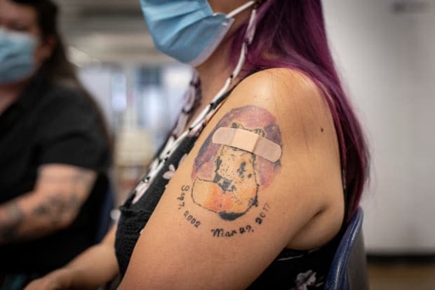 Cheryl Trudeau, 44, waits at a vaccine clinic for Indigenous people, in Toronto, on May 25, 2021. (Evan Mitsui/CBC - image credit)