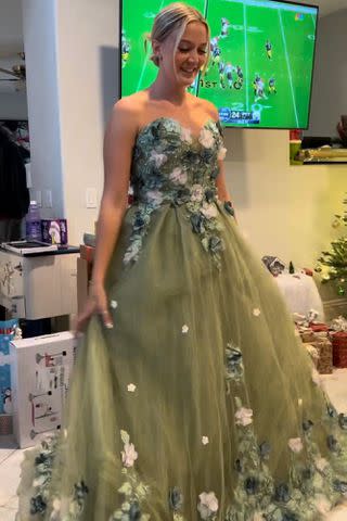 <p>Courtesy of Alexis Roberts</p> Alexis Roberts in a green "ugly dress."