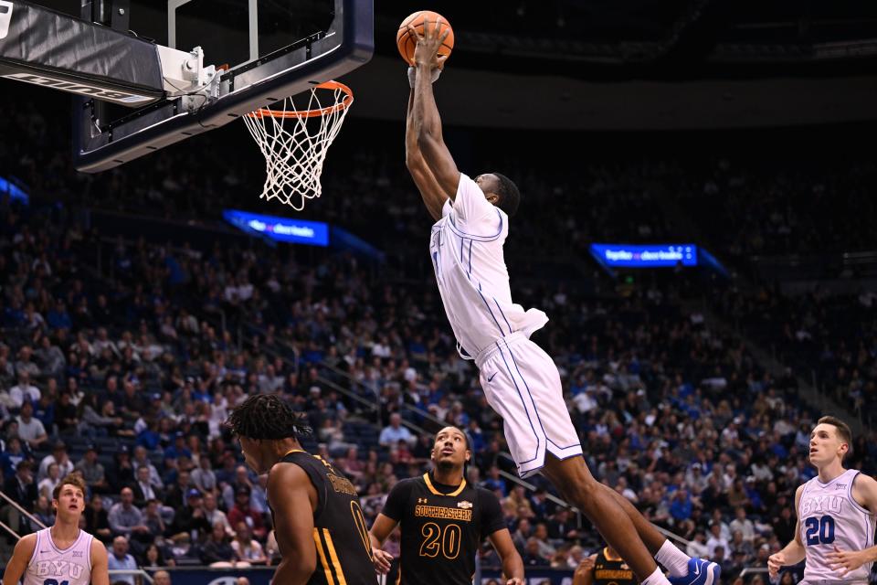 Brigham Young Cougars forward Atiki Ally Atiki (4) flies in for a dunk as BYU and SE Louisiana play at the Marriott Center in Provo on Wednesday, Nov. 15, 2023. BYU won 105-48. | Scott G Winterton, Deseret News