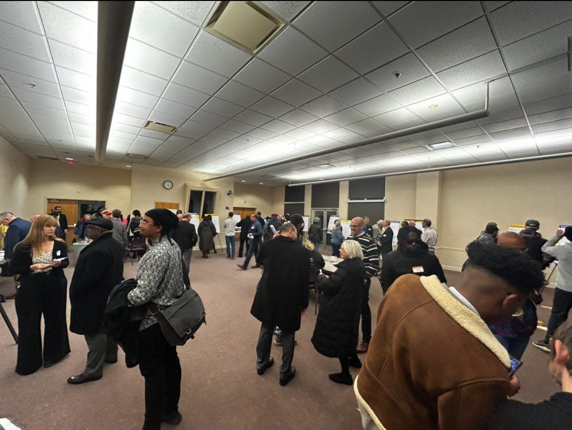 A community BID meeting at Rochester's Central Library.