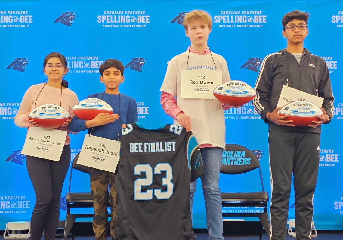 From left to right: Ananya Rao Prassanna of Davis Drive Middle School, Reyansh Joshi of Mills Park Elementary School, Rex Dover of Belmont Middle School and Rishi Jaykumar of Brawley Middle School earned the top four spots at the Carolina Panthers Regional Spelling Bee on March 5, 2023. They’ll advance to the Scripps National Spelling Bee.