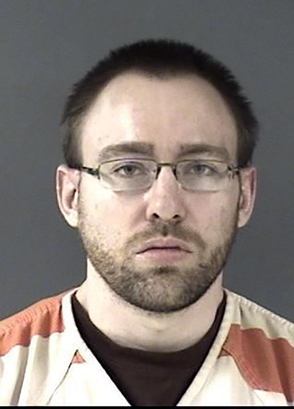 This booking photo provided by the Laramie County Sheriff's Office shows suspect Wyatt Dean Lamb. Lamb is accused of burning a toddler with a butane torch, killing him and disposing of his body in an apartment complex dumpster in February, has had his bail set at $1 million. Bail was set for Lamb, the boyfriend of the girl's mother, after he made his first court appearance Tuesday, June 29, 2021, in Cheyenne when he was formally informed of the charges he faces. (Laramie County Sheriff's Office via AP)