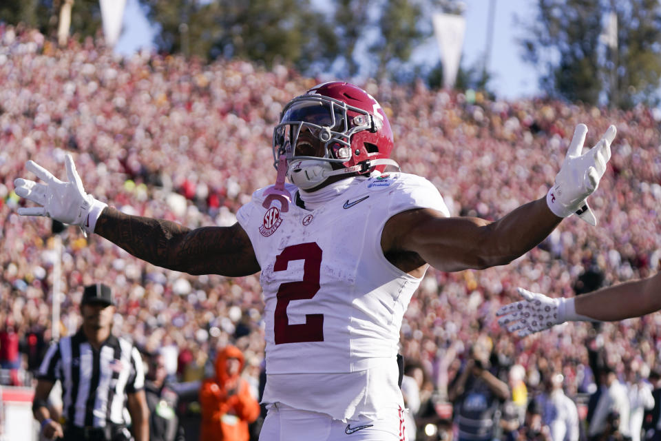 Alabama running back Jase McClellan (2) celebrates as he scores a rushing touchdown during the first half in the Rose Bowl CFP NCAA semifinal college football game against Michigan, Monday, Jan. 1, 2024, in Pasadena, Calif. (AP Photo/Mark J. Terrill)