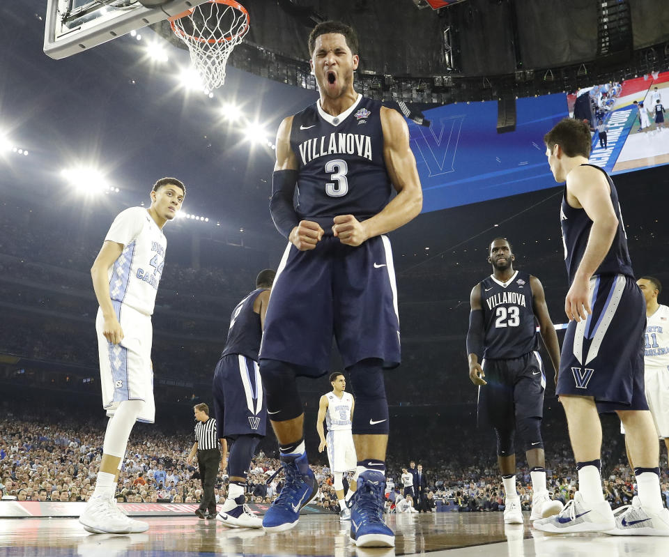 FILE - In this Monday, April 4, 2016, file photo, Villanova guard Josh Hart (3) reacts to play against North Carolina during the second half of the NCAA Final Four tournament college basketball championship game in Houston. The NCAA and networks across the sports dial have infused fans with a hoops fix by rebroadcasting epic NCAA Tournament games. Coaches and players involved in those games are adding insight and a dash of humor by live tweeting during the replay. (AP Photo/David J. Phillip, File)