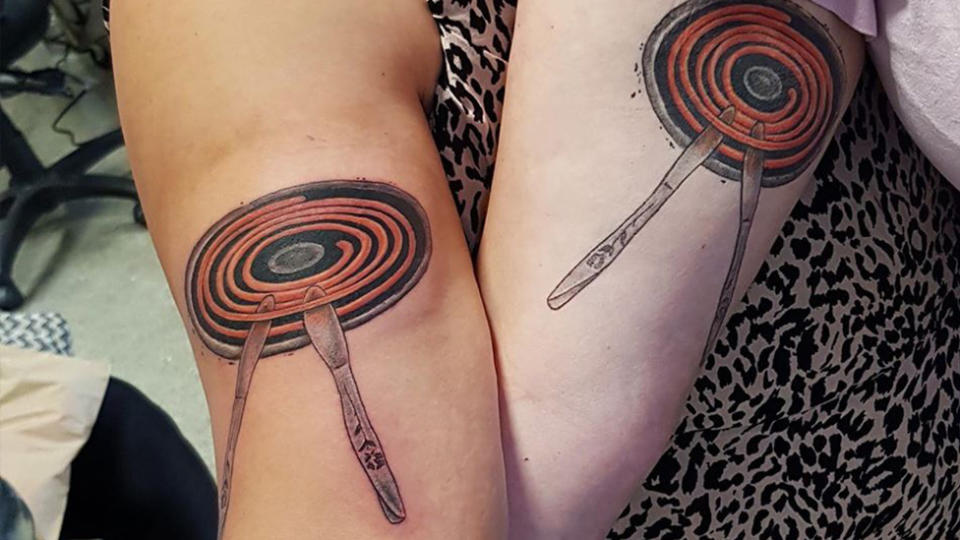 The tattoo of butter knives heating up on a stove caused confusion and outrage. Source: Arkay Tattooer/Facebook