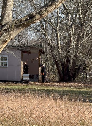 Investigators at the trailer where Chloe Darnell lived before her death. Deputy sheriffs found scales suggesting that Adam Hayes was running a heroin operation out of the home, Lassiter alleges to PEOPLE.