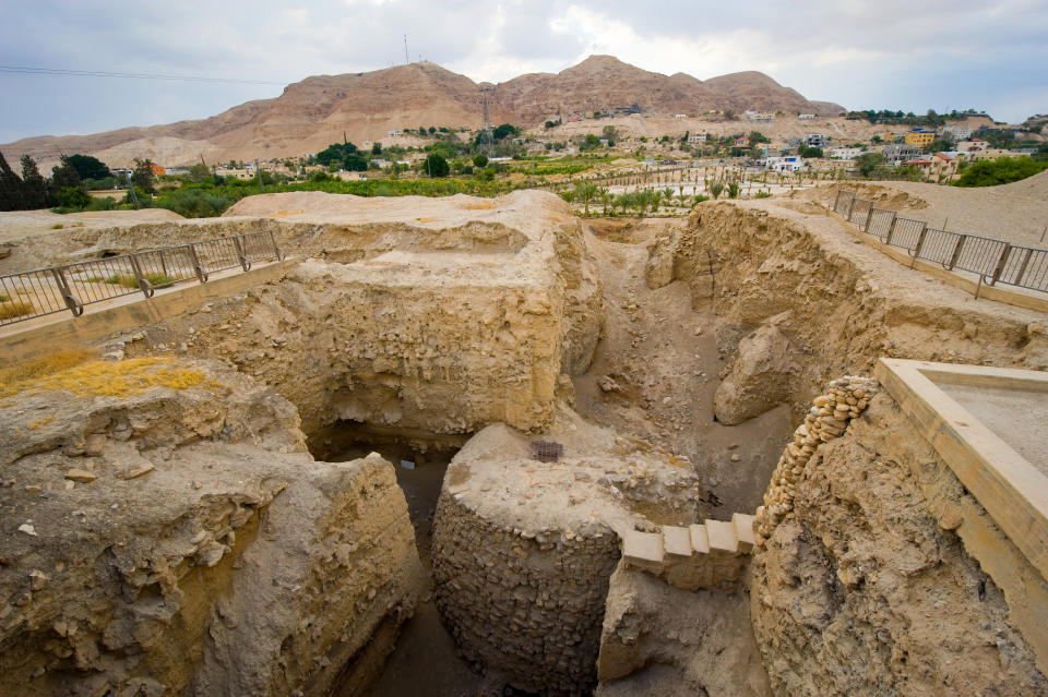 Old ruins and remains in Tell es-Sultan better known as Jericho the oldest city in the world, with the mount of temptation on the background.