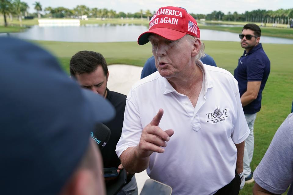 Oct 27, 2022; Miami, Florida, USA; Former President Donald Trump speaks with the media following his round during the Pro-Am tournament before the LIV Golf series at Trump National Doral. Mandatory Credit: Jasen Vinlove-USA TODAY Sports