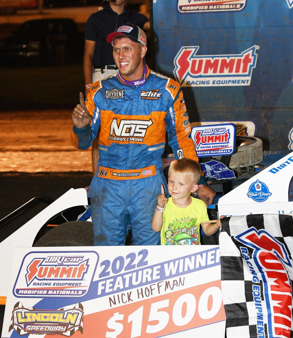 Nick Hoffman celebrates with his son, Maddox, after winning last weekend's Summit Modified National race at the Lincoln Speedway in Lincoln. Hoffman, the current point leader and winner of 17 modified races out of 20 starts, will be the favorite to win at Farmer City Raceway this Friday.