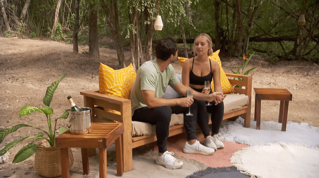 <p>ABC</p> Joey and Daisy take a break on a random jungle couch on 'The Bachelor'