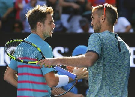 Tennis - Australian Open - Melbourne Park, Melbourne, Australia - 20/1/17 Switzerland's Stan Wawrinka shakes hands after winning his Men's singles third round match against Serbia's Viktor Troicki. REUTERS/Jason Reed