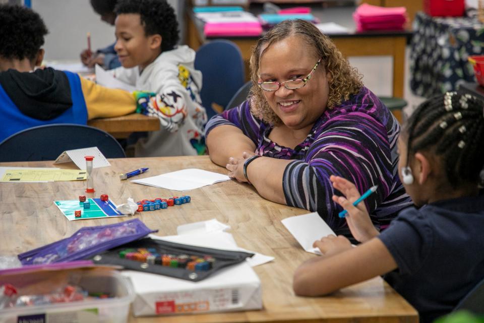 Coach LaTrelle Pierre, of Oak Park, practices academic games like WFF’N Proof and Equations with her team in preparation for the upcoming Michigan League of Academic Games Super Tournament that will be held in March, after school at Foreign Language Immersion and Cultural Studies School in Detroit on Tuesday, Feb. 6, 2024. Pierre has been a part of a rich Academic Games tradition at Detroit public schools as a student participant and as a coach, and she was mentored by one of Detroit's legendary teachers and Academic Games coaches, Christopher Holstein.