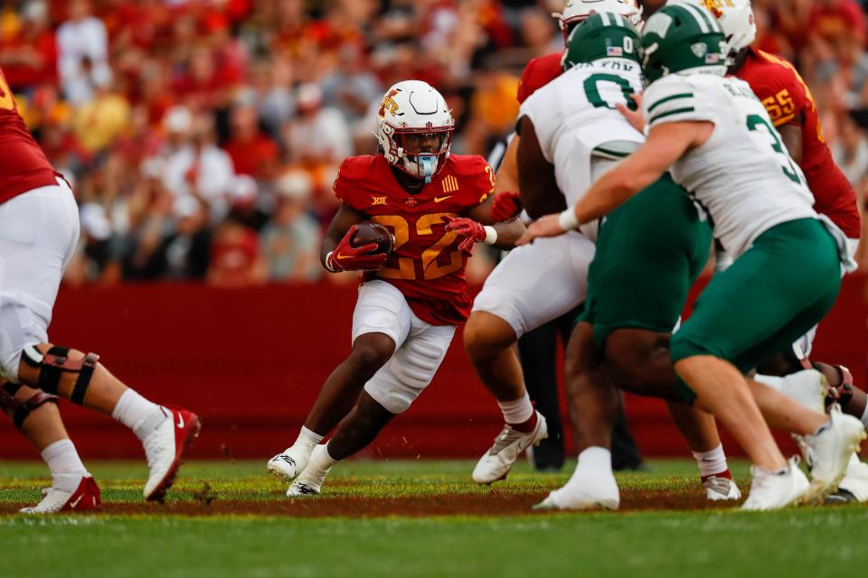 Iowa State running back Deon Silas (22) attempts to break through the line during the game at Jack Trice Stadium in Ames.