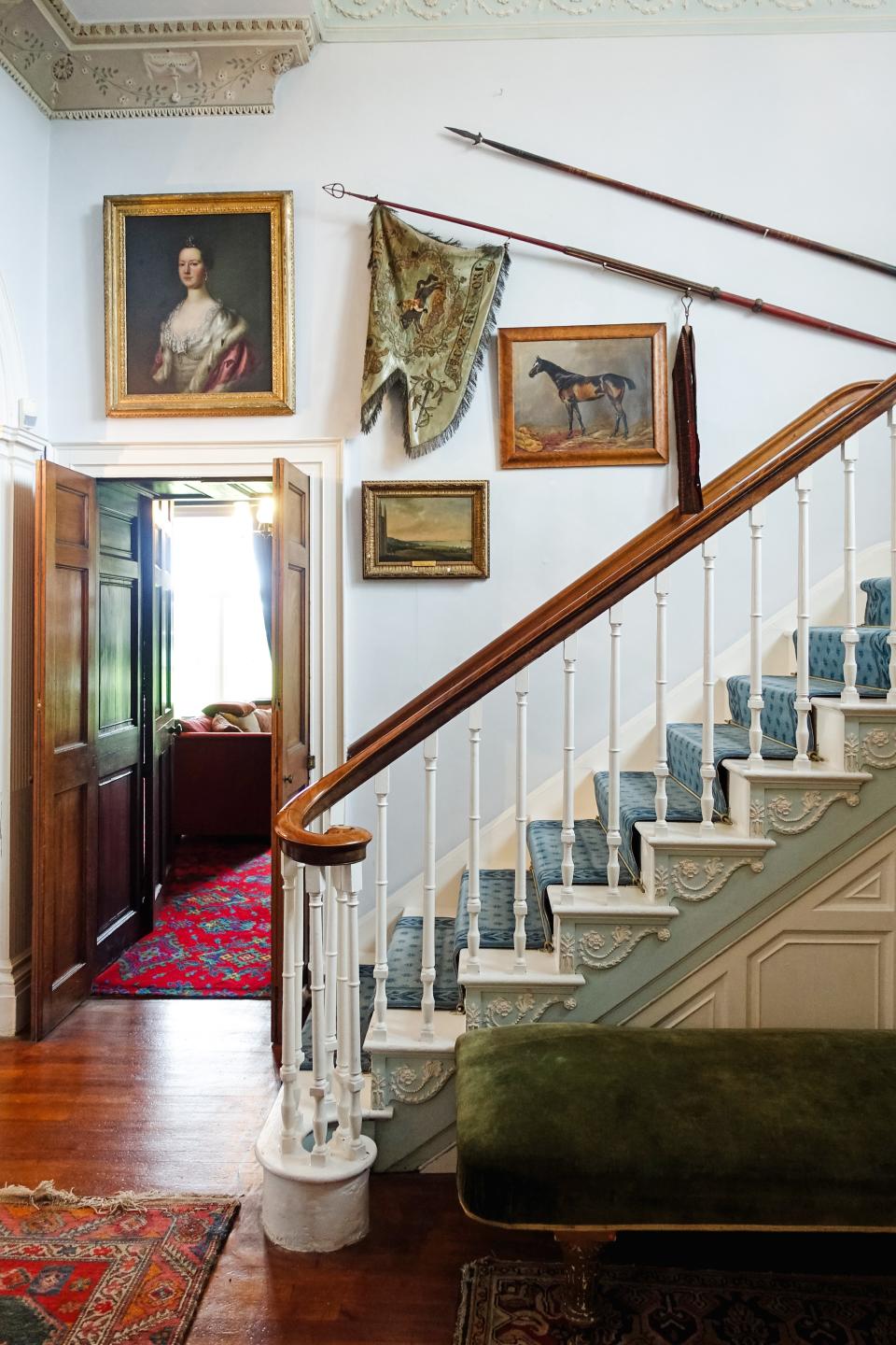 A flying staircase (a rarity in Ireland) leads to the second and third floors. This hall is grand and sun-soaked, with light from the Venetian window flooding through to the main hall. Legend has it that the 26th Knight of Glin, Desmond Fitzgerald (also known as “Cracked Jack”), would ride his horse up the flying staircase every evening before turning in for bed.