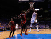 Kevin Durant of the Oklahoma City Thunder dunks the ball over Joel Anthony and Chris Bosh of the Miami Heat in the second quarter in Game One of the 2012 NBA Finals at Chesapeake Energy Arena on June 12, 2012 in Oklahoma City, Oklahoma. (Photo by Jim Young/Pool/Getty Images)