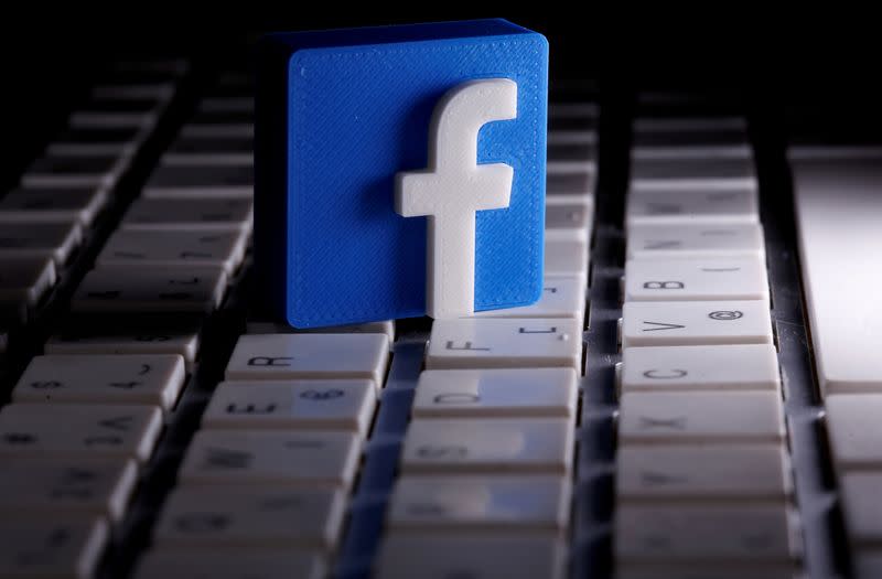 FILE PHOTO: FILE PHOTO: A 3D-printed Facebook logo is seen placed on a keyboard in this illustration