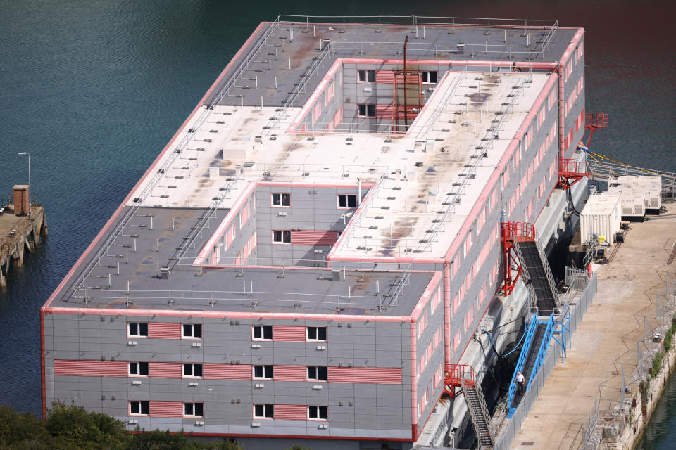 PORTLAND, ENGLAND - AUGUST 7: A general view of the Bibby Stockholm immigration barge on August 7, 2023 in Portland, England. Approximately 50 arrivals are set to board the Bibby Stockholm, moored at Portland in Dorset, as part of the Home Office's plan to accommodate up to 500 migrants on the vessel. The barge is equipped with amenities like a TV room, multi-faith prayer room, classroom, gym, and outdoor recreational space, ensuring it offers 24-hour security and healthcare provision. Addressing concerns raised by the firefighters' union, Immigration Minister Robert Jenrick last week assured the public that the Bibby Stockholm is a "safe facility." (Photo by Dan Kitwood/Getty Images)