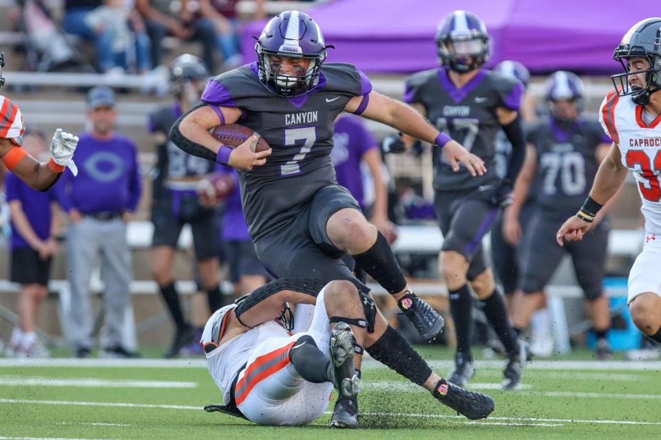 Canyon's Sam Johnson (7) runs with the ball against Caprock, Thursday, Sept. 15, 2022, at Happy State Bank Stadium in Canyon. Canyon won, 35-32.