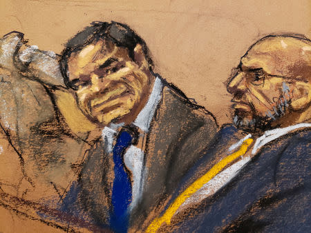 Accused Mexican drug lord Joaquin "El Chapo" Guzman and defense attorney A. Eduardo Balarezo, sit in court in this courtroom sketch during Guzman's trial in Brooklyn federal court in New York City, U.S., January 30, 2019. REUTERS/Jane Rosenberg