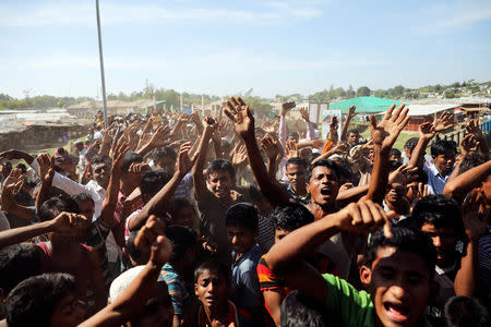 Hundreds of Rohingya refugees shout slogans as they protest against their repatriation at the Unchiprang camp in Teknaf, Bangladesh November 15, 2018. REUTERS/Mohammad Ponir Hossain