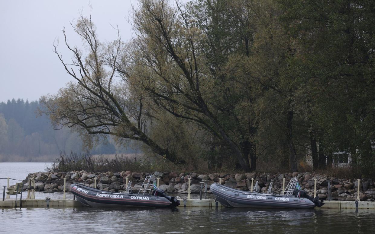 Rubber speedboats of the Russian border guard lie moored at Lake Vistytis on the Russian side of the border between the Russian semi-exclave of Kaliningrad and Lithuania