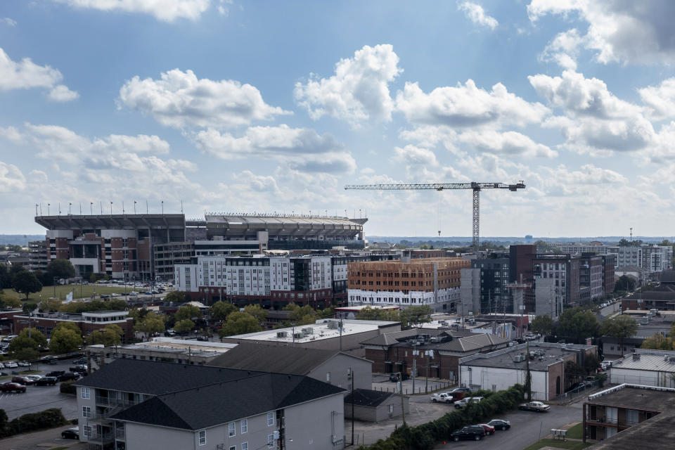 Construction continues on new student housing beside the University of Alabama, Wednesday, Oct. 13, 2021, in Tuscaloosa, Ala. College communities such as Tuscaloosa are exploring their options for contesting the results of the 2020 census, which they say do not accurately reflect how many people live there. (AP Photo/Vasha Hunt)