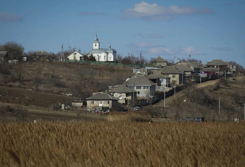 A general view of the village of Budzhak, Moldova, Saturday, March 12, 2022. Across the border from war-engulfed Ukraine, tiny, impoverished Moldova, an ex-Soviet republic now looking eagerly Westward, has watched with trepidation as the Russian invasion unfolds. In Gagauzia, a small, autonomous part of the country that's traditionally felt closer to the Kremlin than the West, people would normally back Russia, which they never wanted to leave when Moldova gained independence. (AP Photo/Sergei Grits)