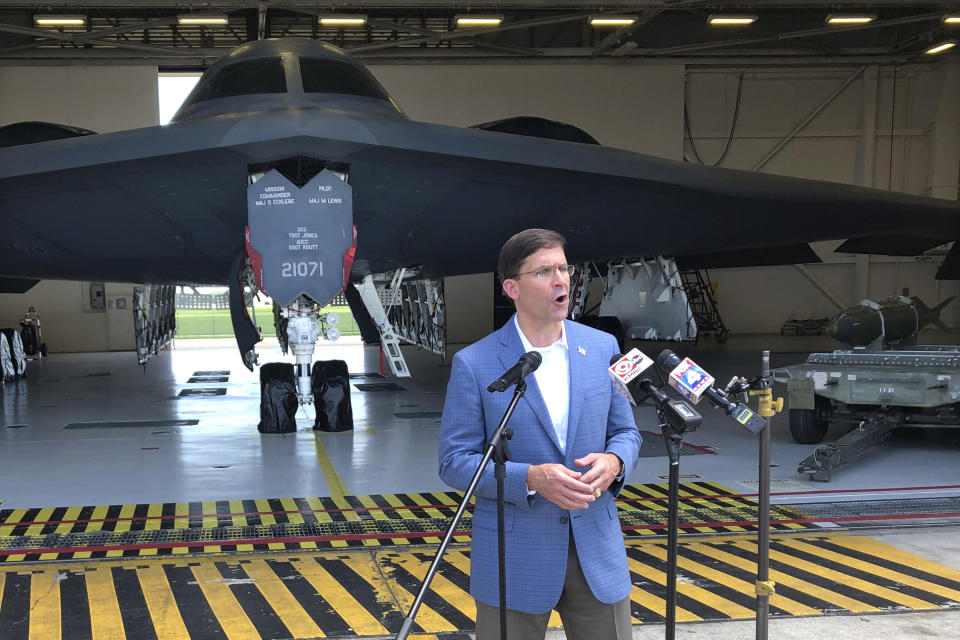 Defense Secretary Mark Esper speaks at Whiteman Air Force Base, Wednesday, July, 22, 2020 in Johnson County, Missouri. Esper is standing in front of a B-2 stealth bomber in a hangar at Whiteman. (AP Photo/Robert Burns)