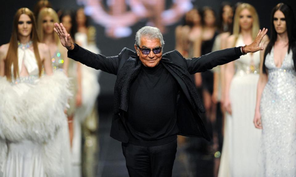 PHOTO: Italian fashion designer Roberto Cavalli attends his fashion show on late evening, June 10, 2013, in the Montenegrin coastal town of Budva.  (Savo Prelevic/AFP via Getty Images)