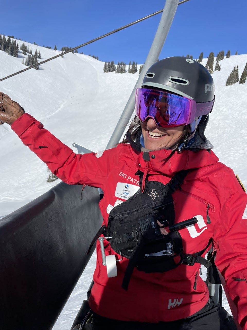 Vail ski patrol supervisor Jenn Silva has a big smile while on the chairlift.