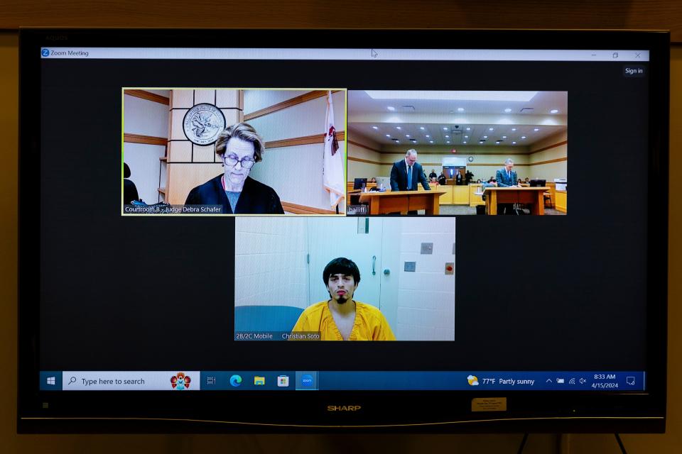 Mass stabbing suspect Christian Soto, bottom, appears in court via close circuit television Monday, April 15, 2024, at the Winnebago County Criminal Justice Center in Rockford.