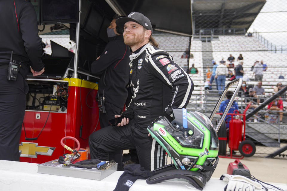 Conor Daly waits for the start of practice for the Indianapolis 500 auto race at Indianapolis Motor Speedway in Indianapolis, Tuesday, May 18, 2021. (AP Photo/Michael Conroy)