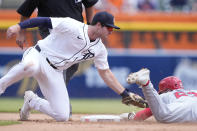 St. Louis Cardinals' Michael Siani is caught stealing by Detroit Tigers second baseman Colt Keith during the sixth inning of a baseball game, Wednesday, May 1, 2024, in Detroit. (AP Photo/Carlos Osorio)