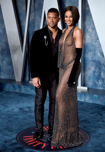 PHOTO: Russell Wilson, left, and Ciara arrive at the Vanity Fair Oscar Party, March 12, 2023, at the Wallis Annenberg Center for the Performing Arts in Beverly Hills, Calif. (Evan Agostini/Invision-AP)