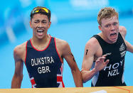 Ben Dijkstra (L) of Great Britain and Daniel Hoy (R) of New Zealand in a photo finish in the Men's Triathlon on day two of Nanjing 2014 Summer Youth Olympic Games.