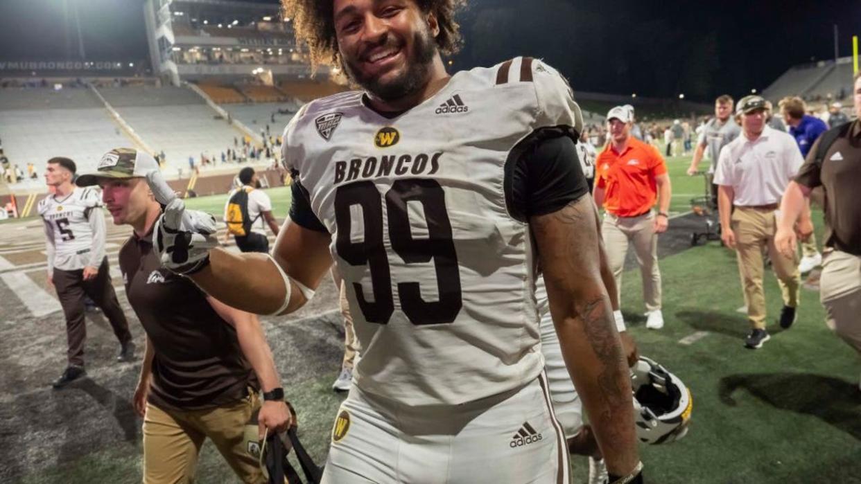 <div>KALAMAZOO, MI - AUGUST 31: Western Michigan Broncos defensive lineman Marshawn Kneeland (99) celebrates after the college football game between the Saint Francis Red Flash and Western Michigan Broncos on August 31, 2023, at Waldo Stadium in Kalamazoo, MI. (Photo by Joseph Weiser/Icon Sportswire via Getty Images)</div>