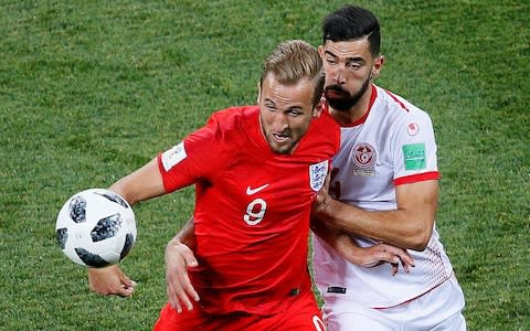 Harry Kane fights for a ball during the match with Tunisia in Volgograd - Credit: Gleb Garanich/Reuters