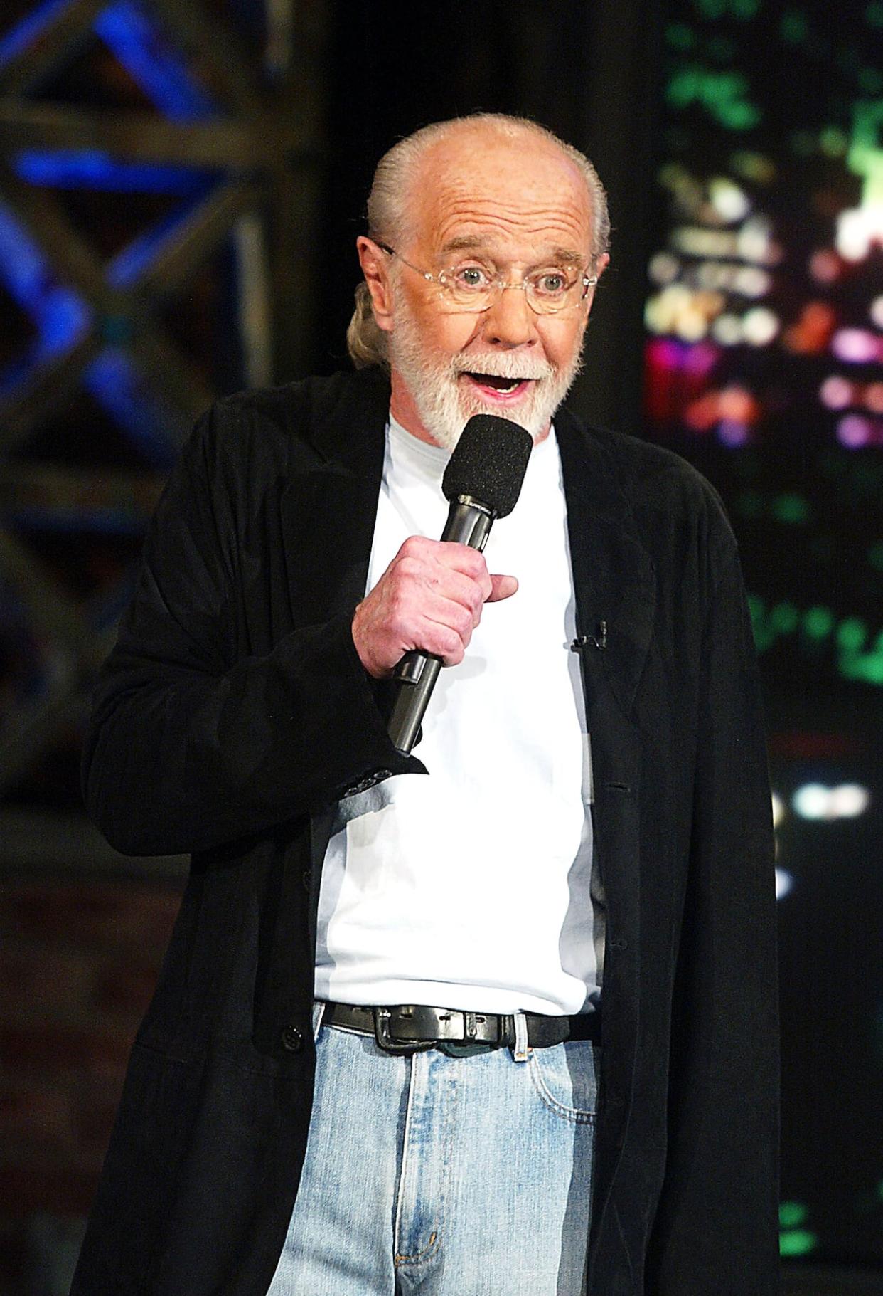 George Carlin during an appearance appears on The Tonight Show with Jay Leno in October 2003. The comedian died in 2008. (Kevin Winter/Getty Images - image credit)