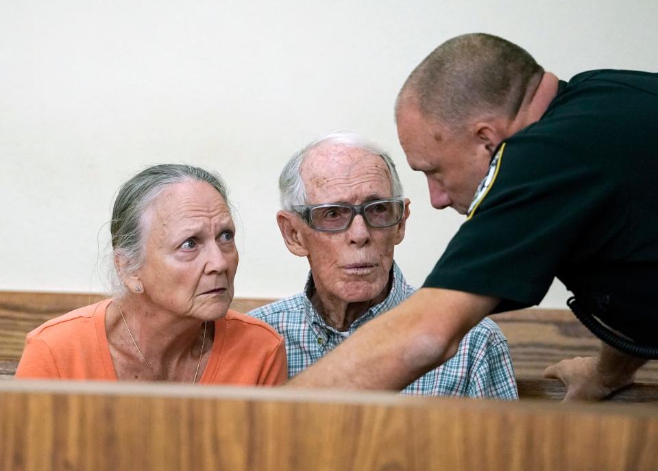 Wanda Hinson, sister of murder victim Linda Little, and her husband, Bill, watch Michael Townson make first appearance at the branch jail, Thursday, Nov. 3, 2022.