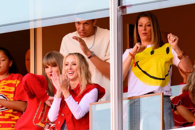 <p>AP Photo/Reed Hoffmann</p> Jackson Mahomes and Randi Martin watch Chiefs game with Taylor Swift and Brittany Mahomes in October 2023