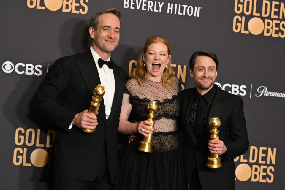 (L-R) English actor Matthew Macfayden poses with the award for Best Performance by a Male Actor in a Supporting Role on Television for "Succession", Australian actress Sarah Snook poses with the award for Best Performance by a Female Actor in a Television Series - Drama for "Succession" and US actor Kieran Culkin poses with the award for Best Performance by a Male Actor in a Television Series - Drama for "Succession" in the press room during the 81st annual Golden Globe Awards at The Beverly Hilton hotel in Beverly Hills, California, on January 7, 2024. (Photo by Robyn BECK / AFP) (Photo by ROBYN BECK/AFP via Getty Images) ORG XMIT: 776070394 ORIG FILE ID: 1908170329