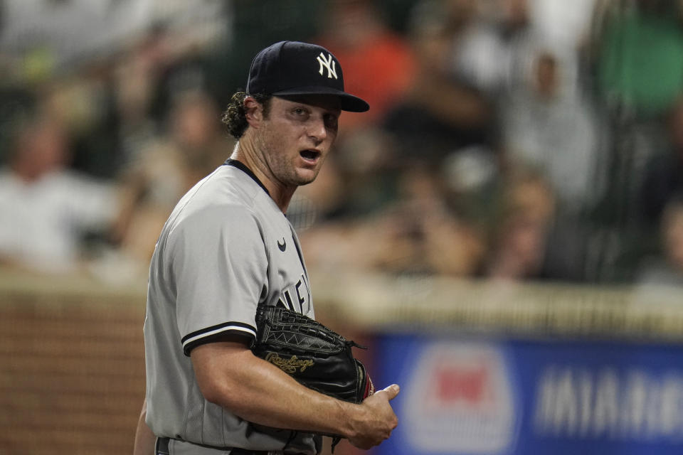 New York Yankees starting pitcher Gerrit Cole talks to himself while heading to the dugout after pitching to the Baltimore Orioles during the third inning of a baseball game, Tuesday, Sept. 14, 2021, in Baltimore. (AP Photo/Julio Cortez)