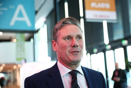 The Labour Party's Shadow Secretary of State for Departing the European Union Keir Starmer walks to a radio interview at his party's conference in Liverpool, Britain, September 25, 2018. REUTERS/Hannah McKay