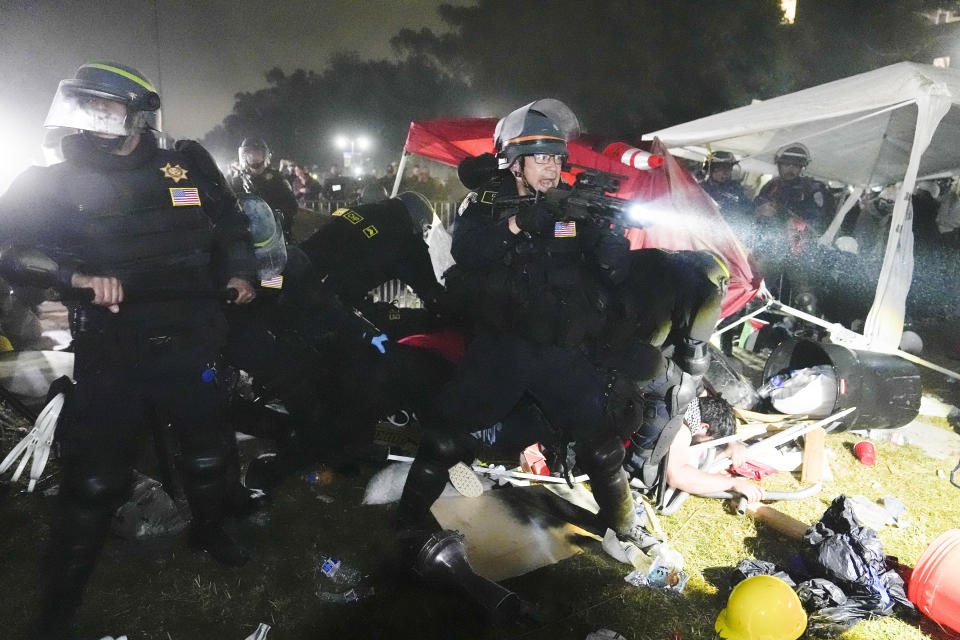 FILE - Police advance on pro-Palestinian demonstrators in an encampment on the UCLA campus Thursday, May 2, 2024, in Los Angeles. (AP Photo/Jae C. Hong, File)