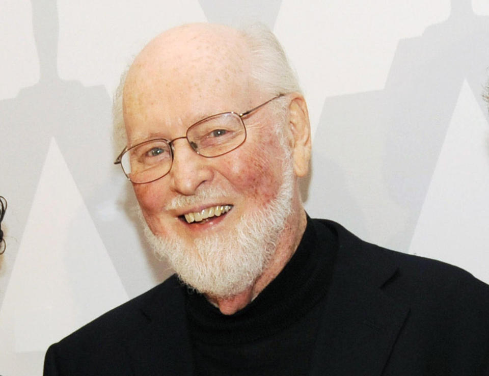 FILE - Composer John Williams poses at the Academy of Motion Picture Arts and Sciences event "Behind the Score: The Art of the Film Composer" in Los Angeles on July 21, 2014. Williams, 90, is devoting himself to composing concert music, including a piano concerto he’s writing for Emanuel X. This spring, he and cellist Yo-Yo Ma released the album “A Gathering of Friends,” recorded with the New York Philharmonic. (Photo by Chris Pizzello/Invision/AP, File)