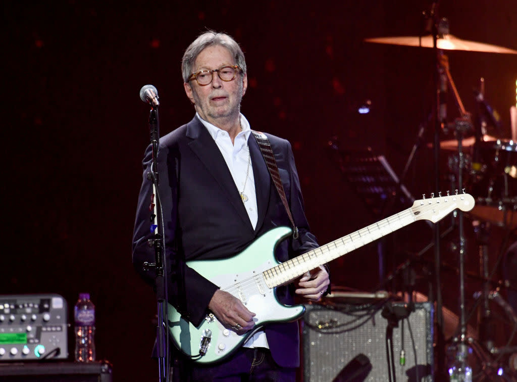 Eric Clapton, seen here during a March 2020 performance in London, has tested positive for COVID-19. (Photo by Gareth Cattermole/Gareth Cattermole/Getty Images)
