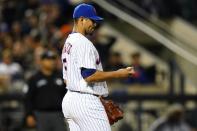 New York Mets starting pitcher Carlos Carrasco looks at a baseball after Miami Marlins' JJ Bleday hit a two-run home run during the third inning of a game Tuesday, Sept. 27, 2022, in New York. (AP Photo/Frank Franklin II)