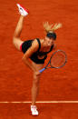 PARIS, FRANCE - JUNE 09: Maria Sharapova of Russia serves in the women's singles final against Sara Errani of Italy during day 14 of the French Open at Roland Garros on June 9, 2012 in Paris, France. (Photo by Clive Brunskill/Getty Images)